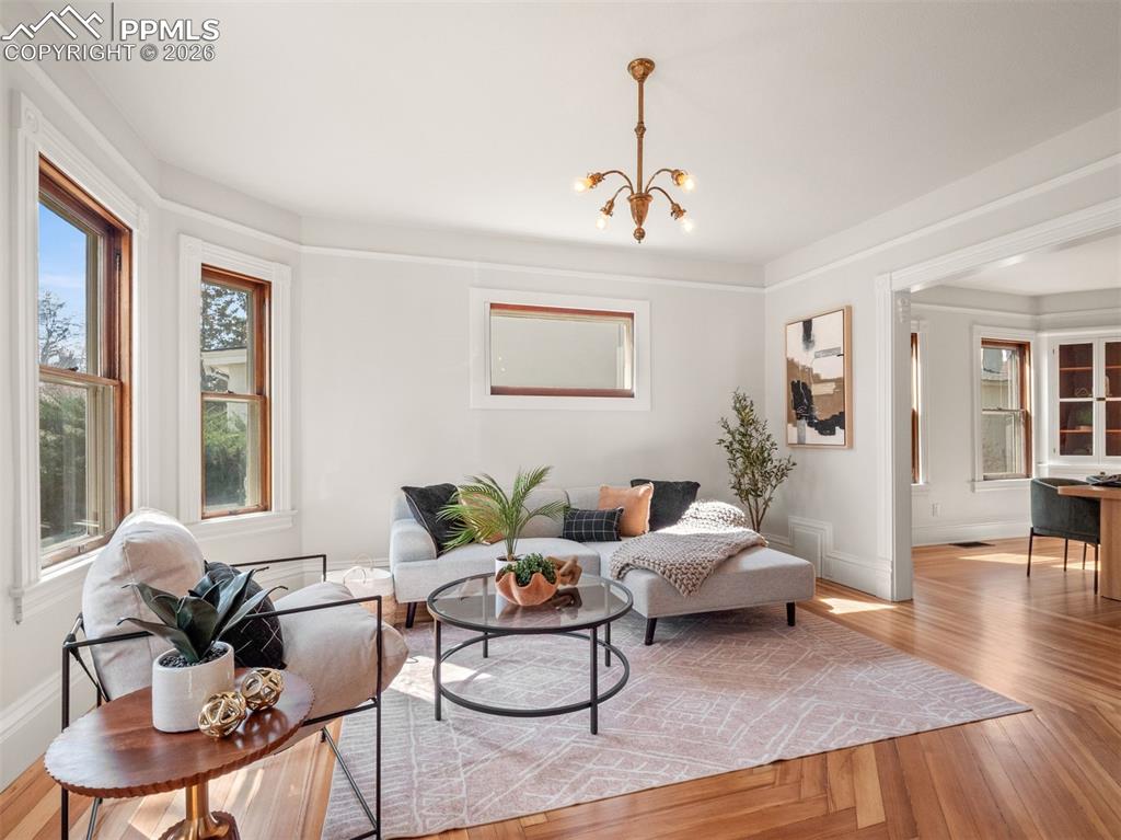 Image 21 of 41: The light fixture is original to the house and has been re-wired. The entir