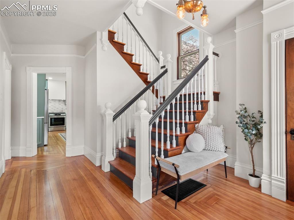 Image 3 of 41: Original features include refinished solid Fir floors, ornate staircase and