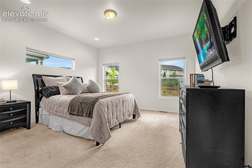 Image 18 of 50: Master Bedroom