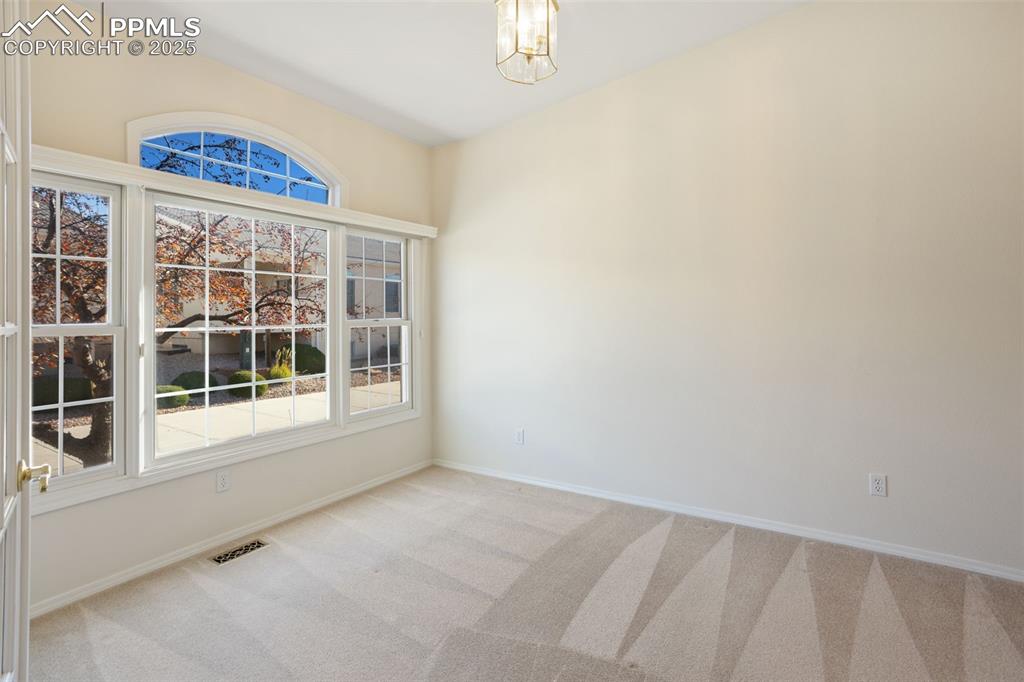 Image 15 of 36: Main Level Secondary Bedroom!