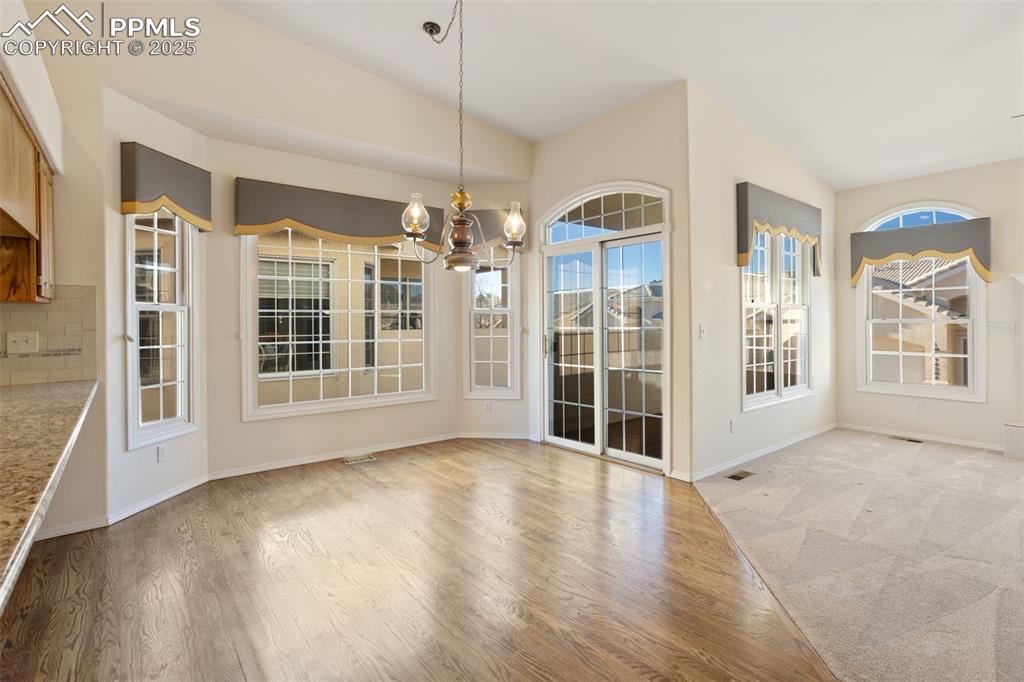 Image 38 of 45: Dining Area Walks out to Balcony!