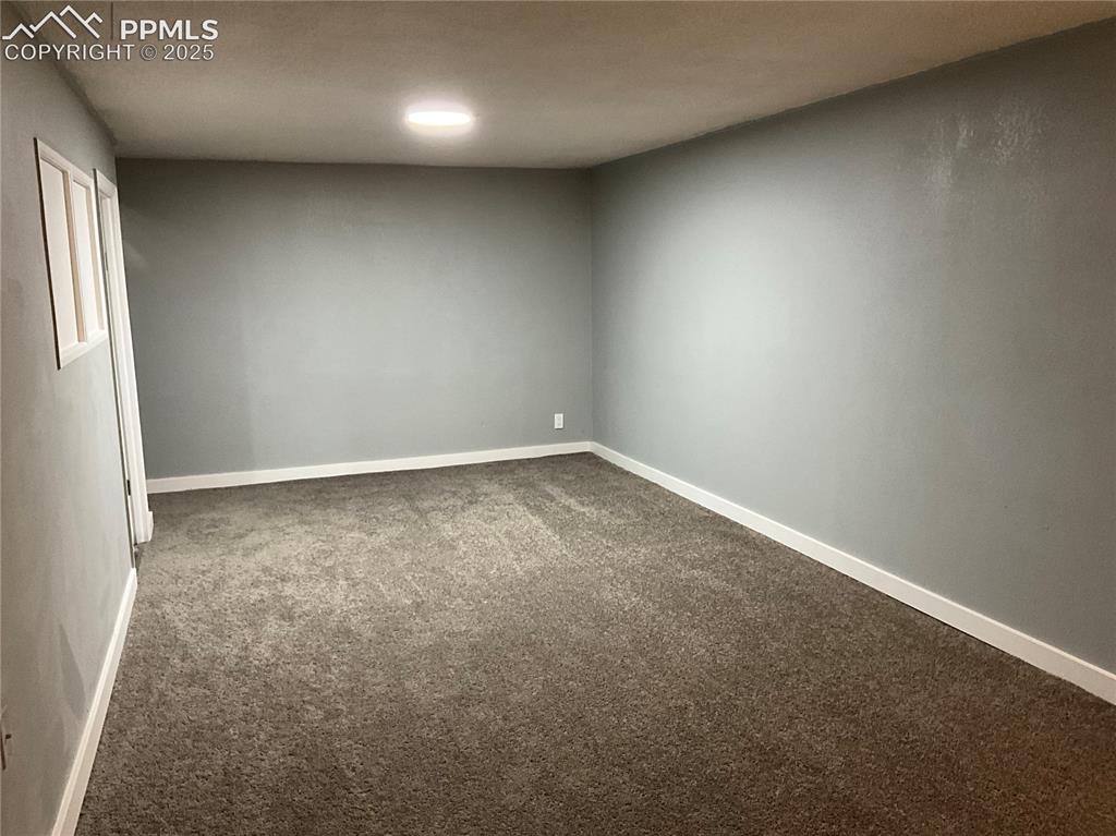 Image 23 of 41: New carpet and baseboards