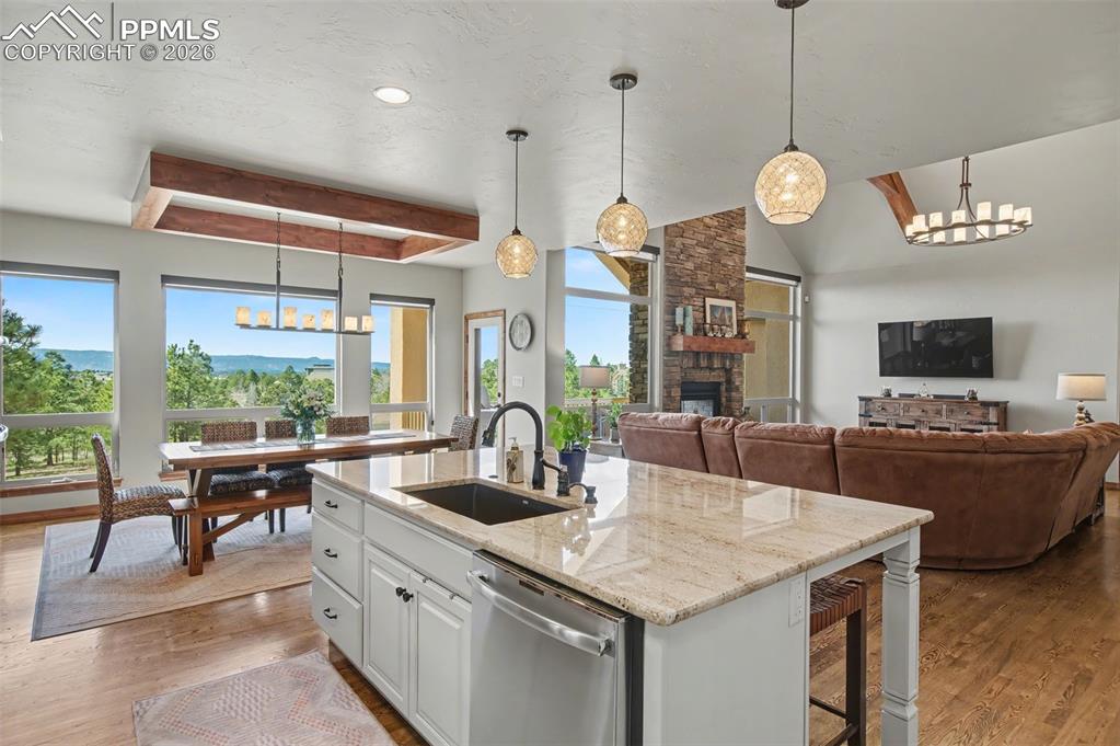 Image 10 of 49: Channel your inner chef in the well-appointed kitchen featuring an oversize