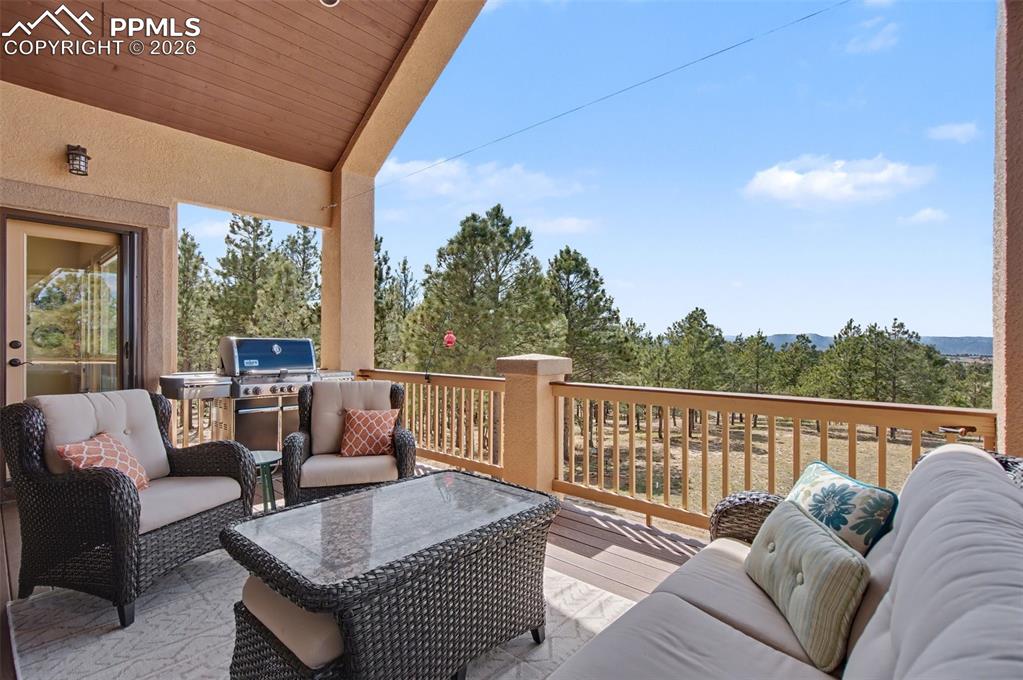 Image 15 of 49: Gather tableside with beautiful views, or dine al fresco on the adjoining d