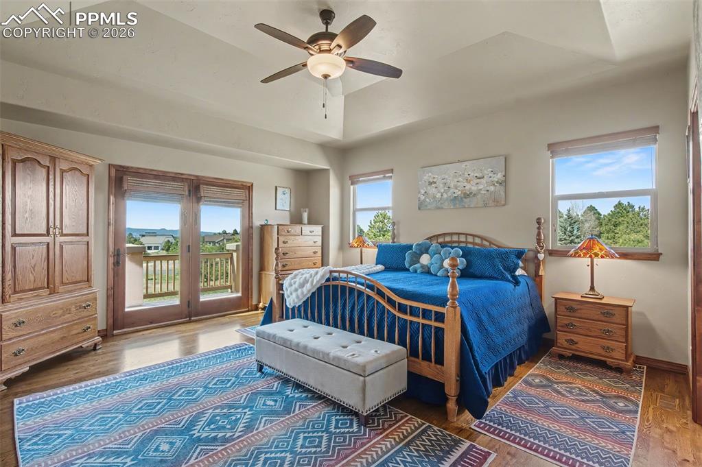 Image 17 of 49: Cozy up by the indoor/outdoor fireplace and enjoy Colorado living at its fi