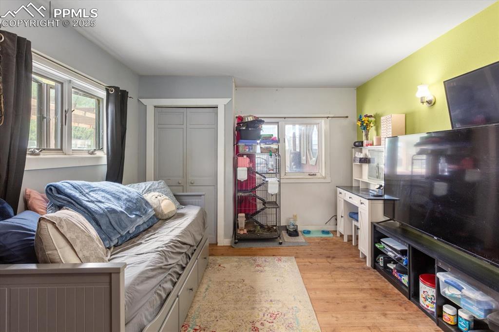 Image 16 of 45: Living area featuring plenty of natural light and light wood-type flooring