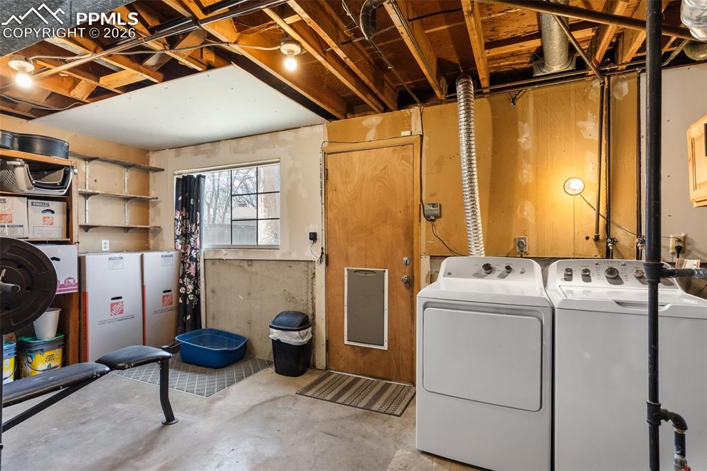 Image 25 of 35: Laundry walks out to the rear yard, W/D only 6 mos old