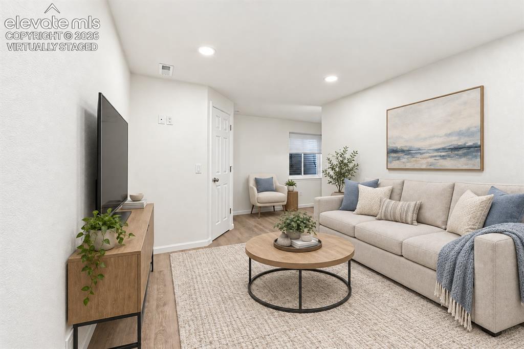 Image 18 of 29: Virtually Staged Family Room