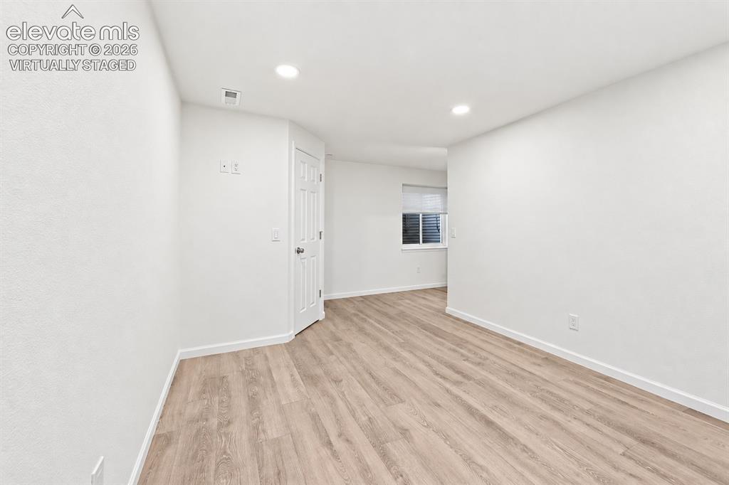 Image 19 of 29: Virtually STaged Family Room