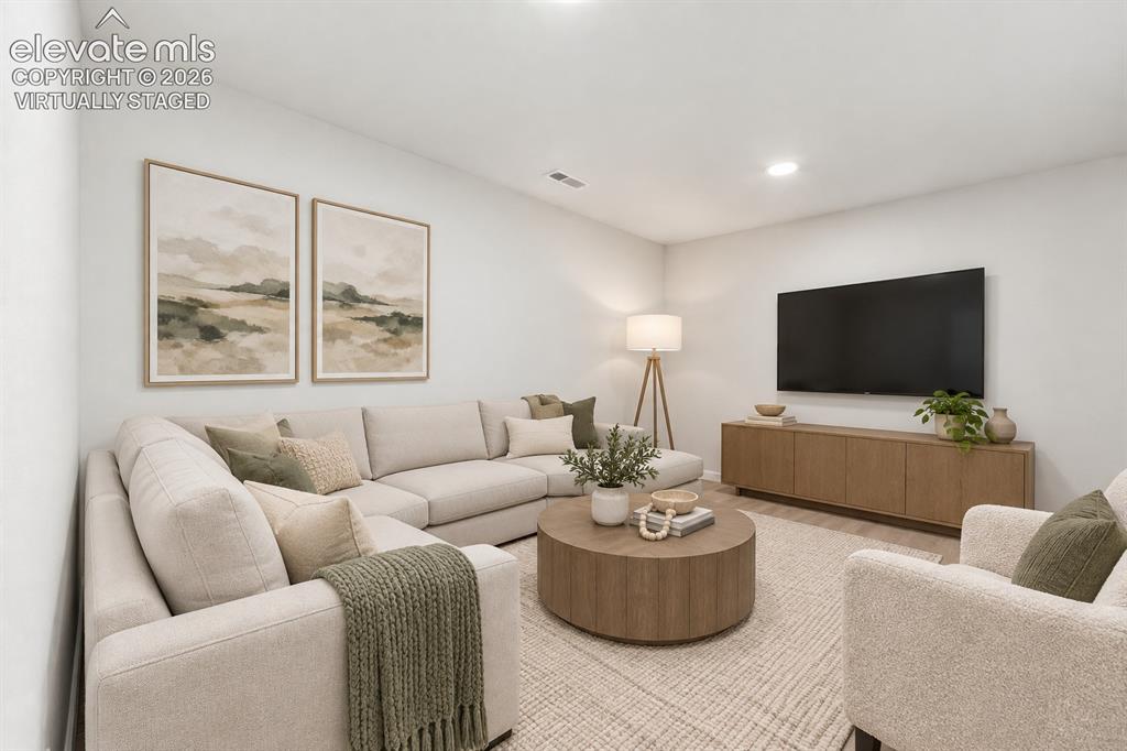 Image 20 of 29: Virtually STaged Family Room
