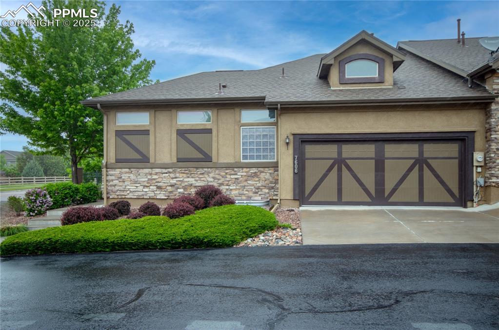 Image 2 of 43: Double stall garage offers easy access to inside the home.