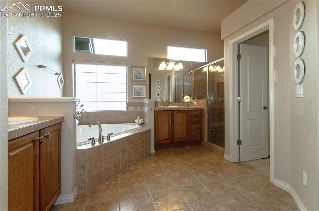 Image 23 of 43: Glass block window providing natural light and style while maintaining priv