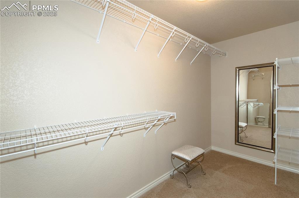 Image 33 of 43: Built in selving and dressing area.