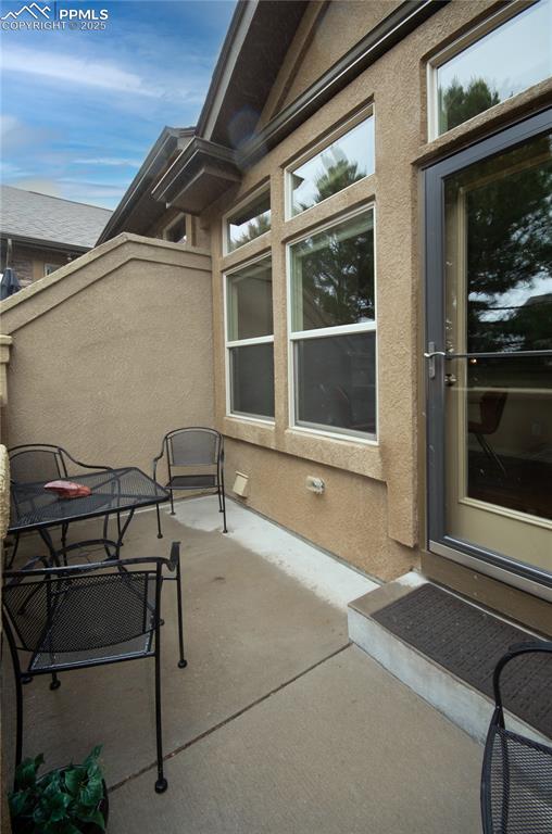 Image 40 of 43: Walk-out patio offers an inviting outdoor space that is secluded.