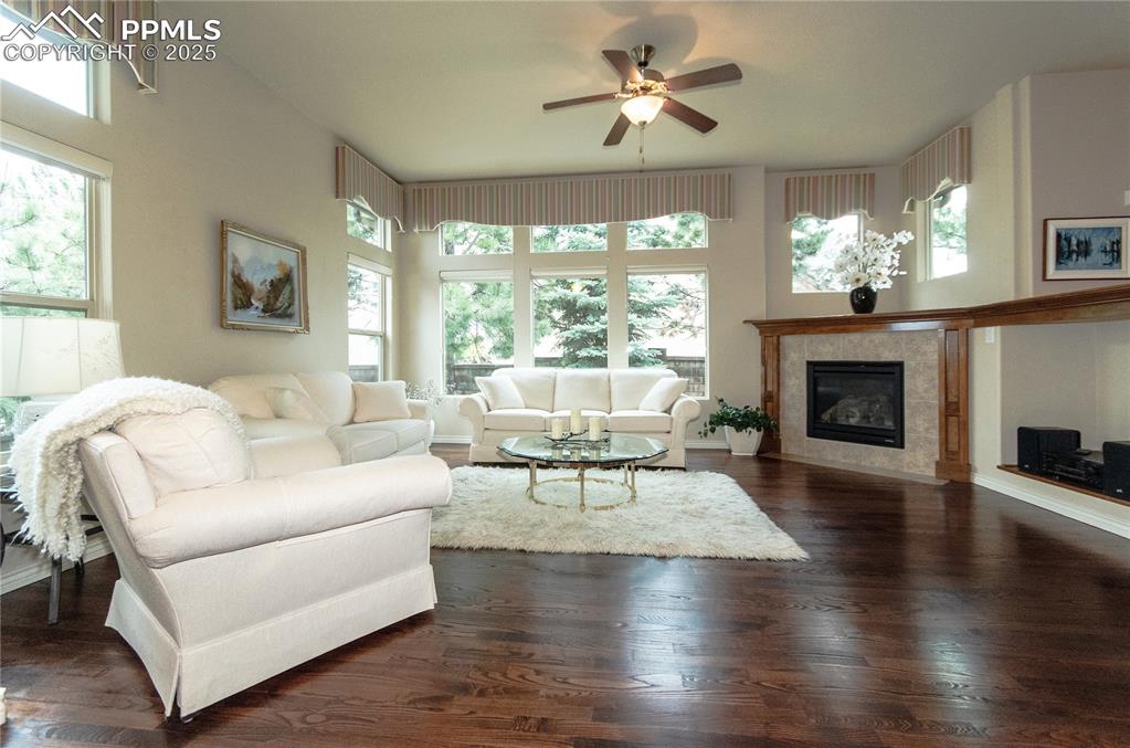 Image 8 of 43: Great room with gas-log fireplace.