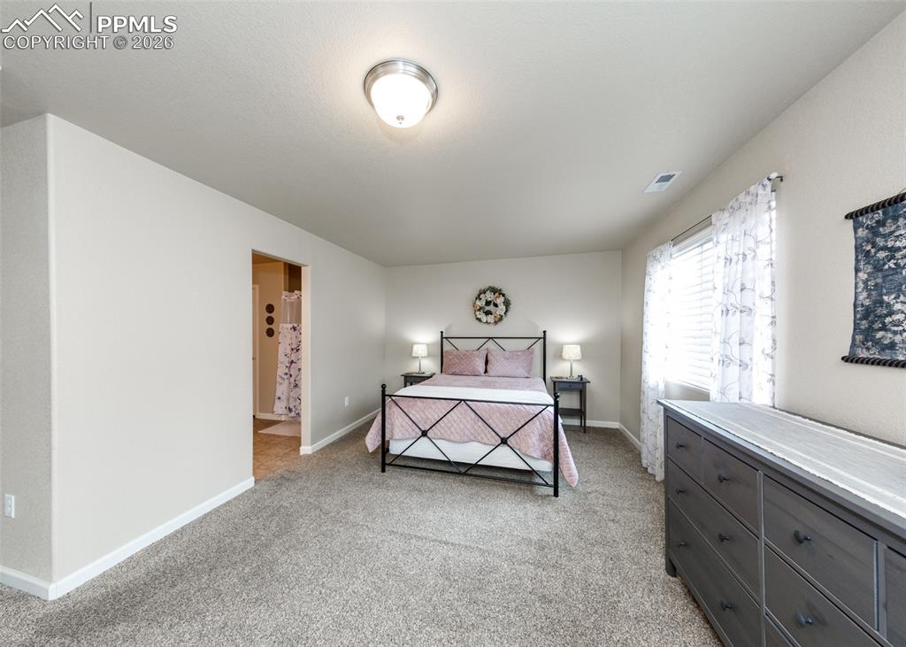 Image 23 of 48: Master Bedroom