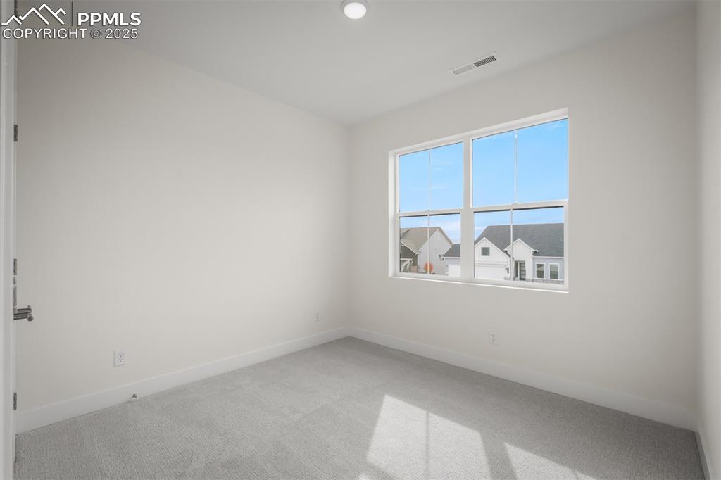 Image 28 of 39: Bedroom