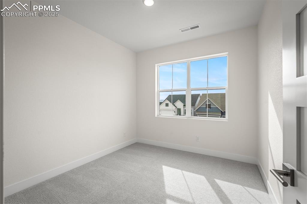 Image 30 of 39: Bedroom