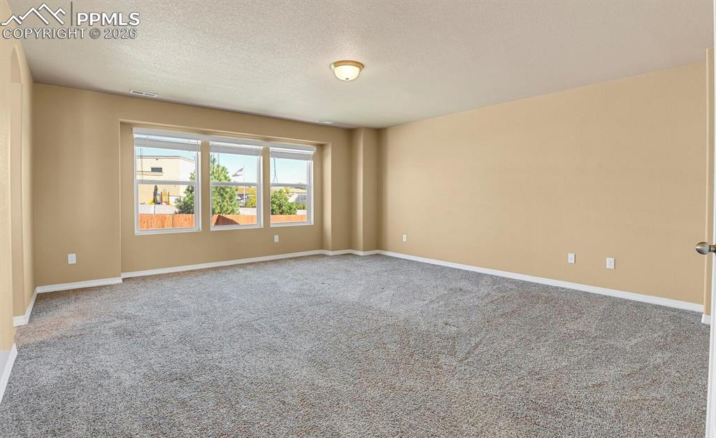 Image 18 of 29: Master Bedroom