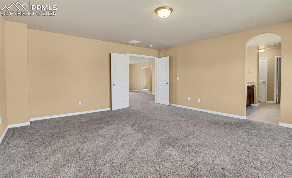 Image 20 of 29: Bedroom with en-suite bathroom