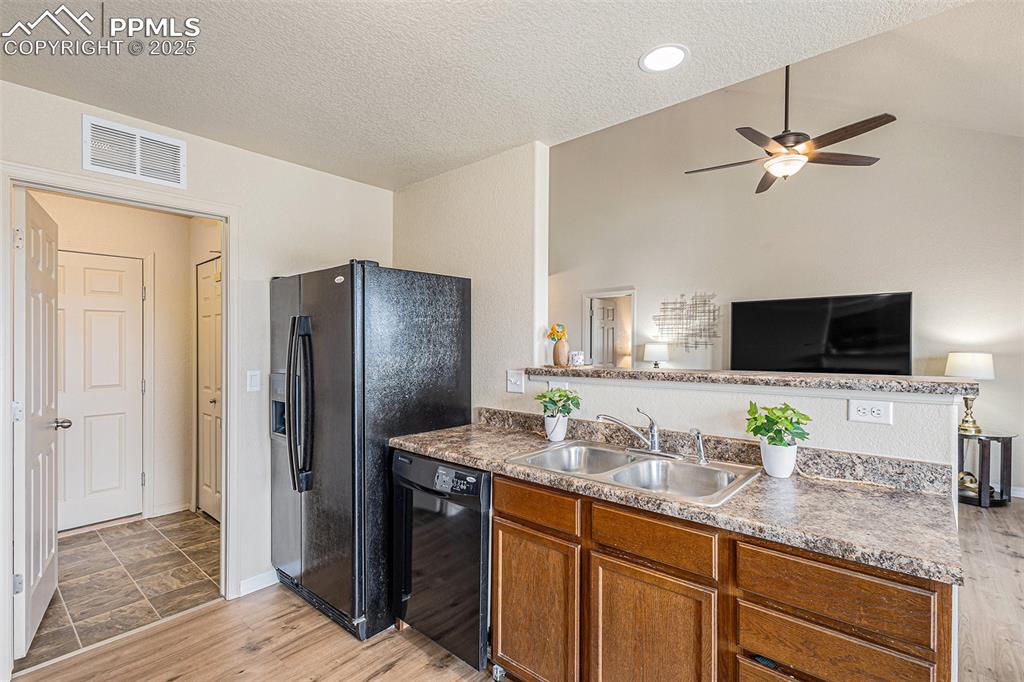 Image 12 of 36: Kitchen with Laminate Counters
