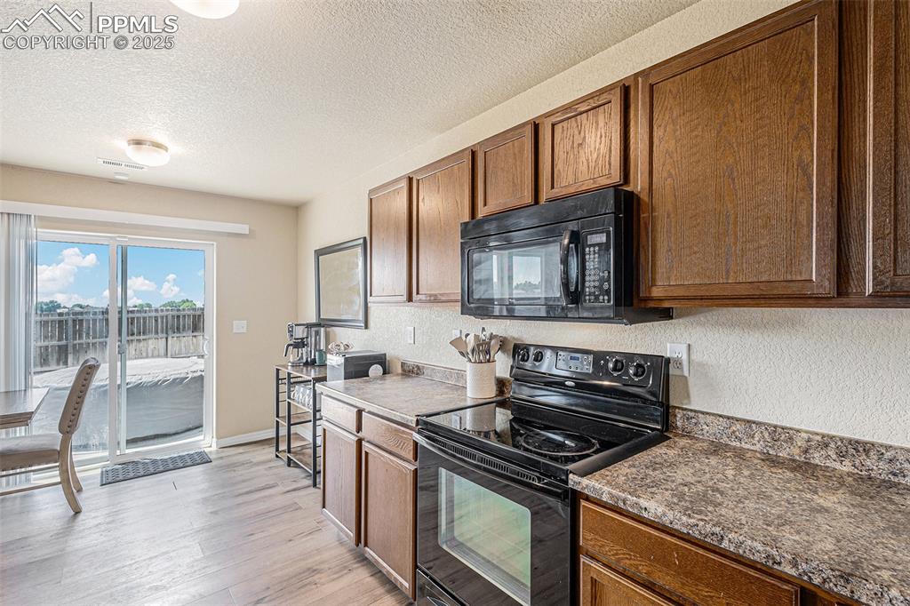 Image 14 of 36: Kitchen with Plenty of Cabinet Space
