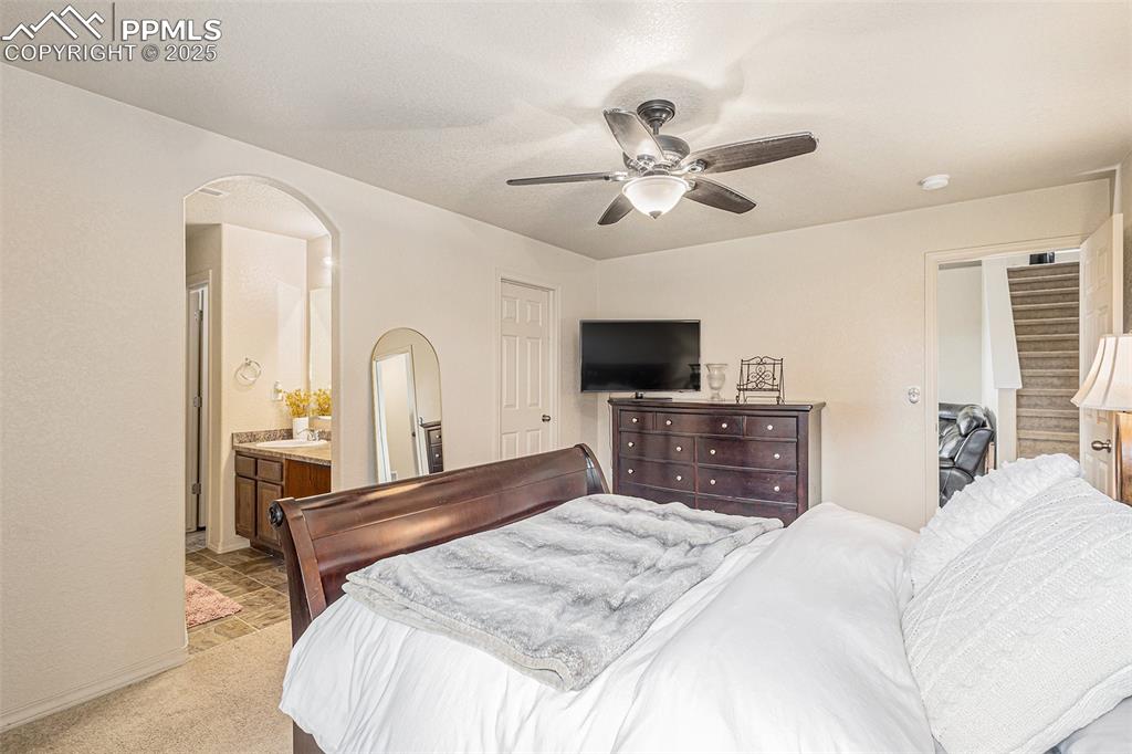 Image 20 of 36: Master Bedroom with Vaulted Ceiling
