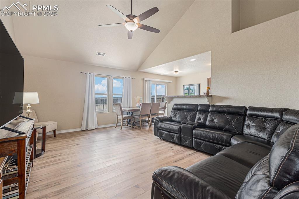 Image 5 of 36: Family Room with High and Vaulted Ceilings
