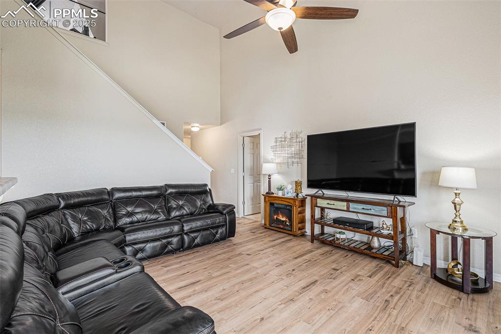 Image 6 of 36: Family Room with LVP flooring
