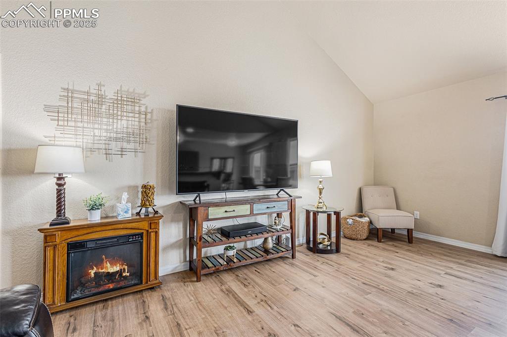 Image 7 of 36: Family Room with Fireplace