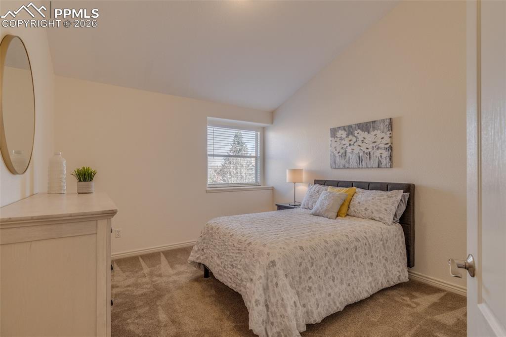 Image 27 of 50: Upper level bedroom