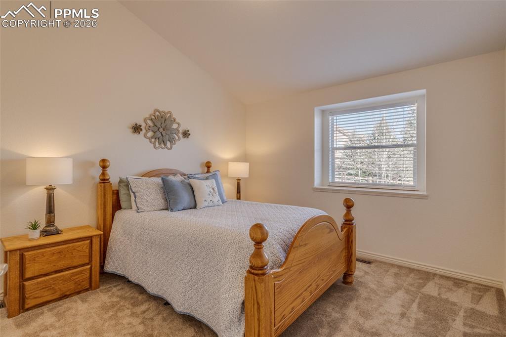 Image 31 of 50: Upper level bedroom