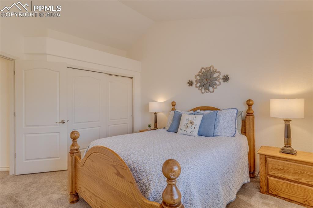 Image 32 of 50: Upper level bedroom