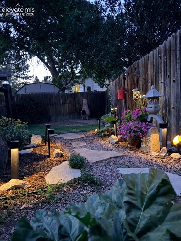Image 28 of 35: Night Photo of the Backyard
