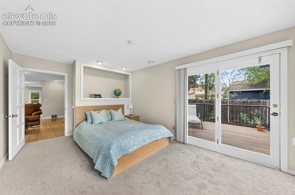 Image 17 of 40: Primary Bedroom on the Main Level