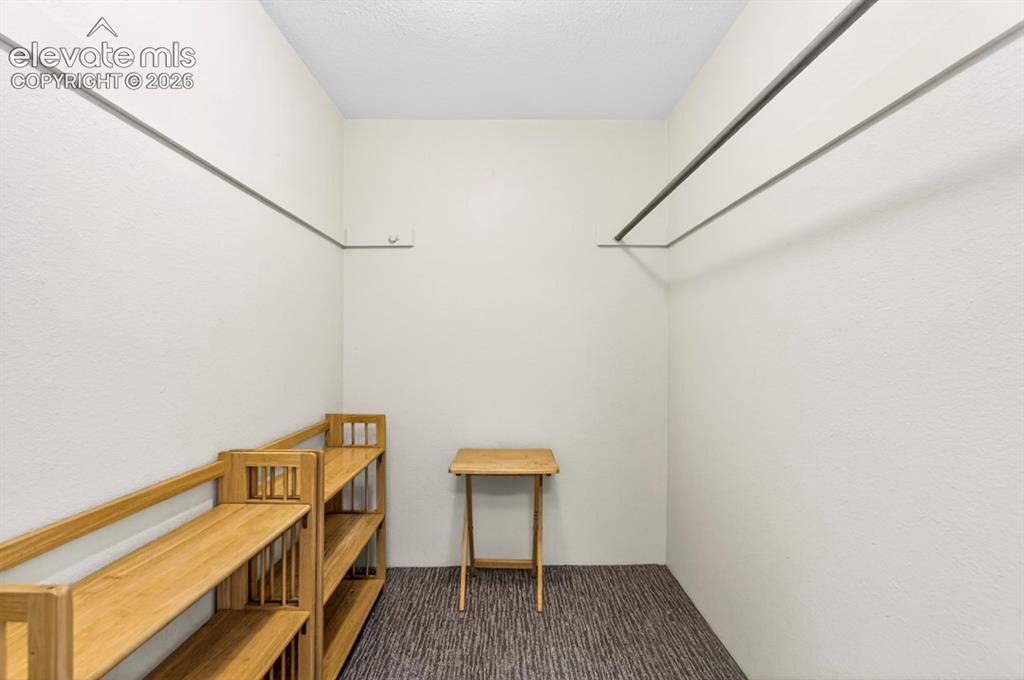 Image 20 of 40: Primary Walk-in Closet