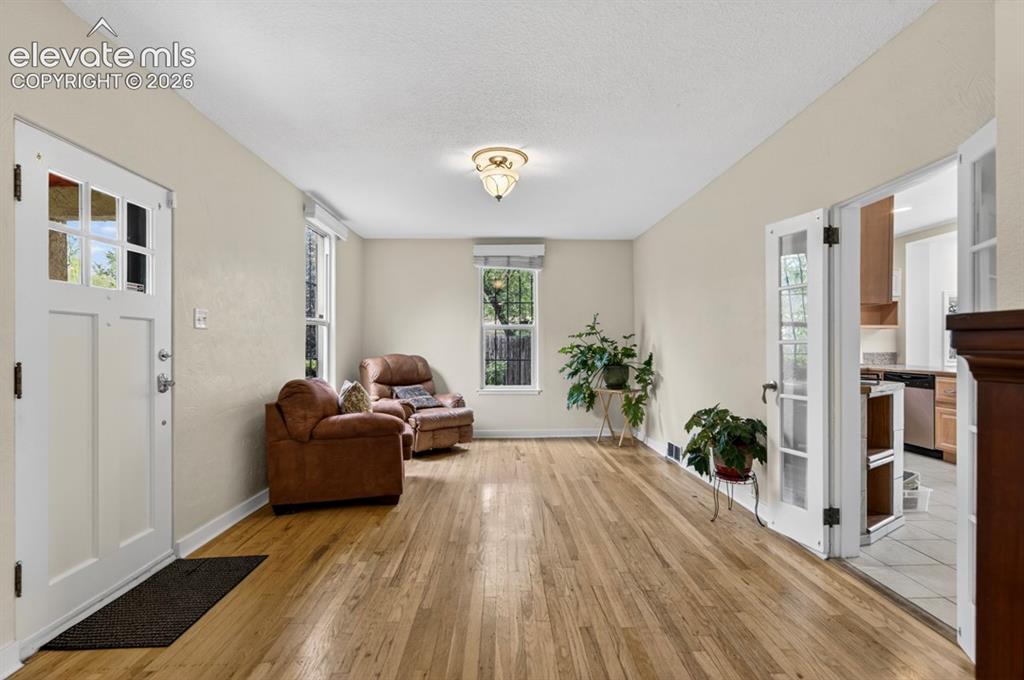 Image 27 of 40: Bonus Room: Could be Office, Dining Room, Sitting Room, or Reading Room.