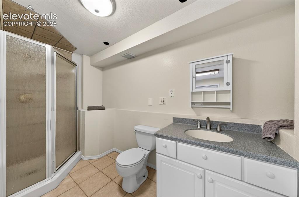 Image 35 of 40: Lower Level Bathroom
