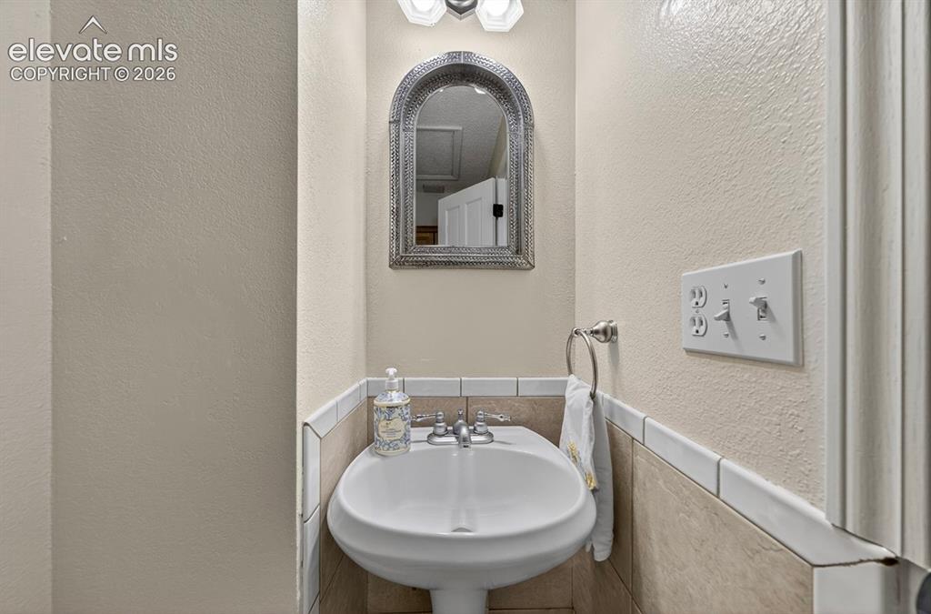 Image 36 of 40: Half Bath on the Main Level