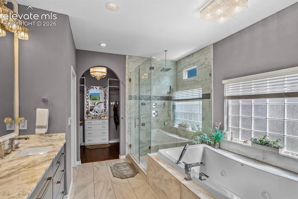 Image 19 of 38: The jetted tub keeps water warm as you relax