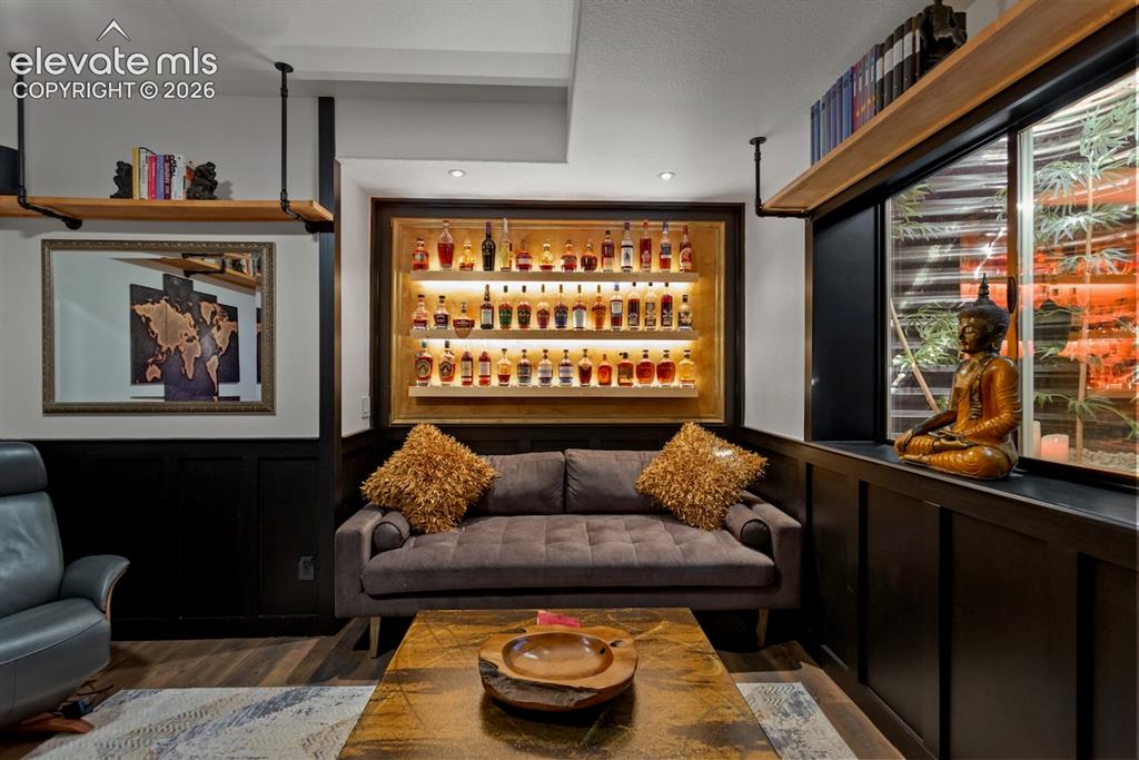 Image 27 of 38: This bedroom with attached bathroom is a speakeasy with many special featur