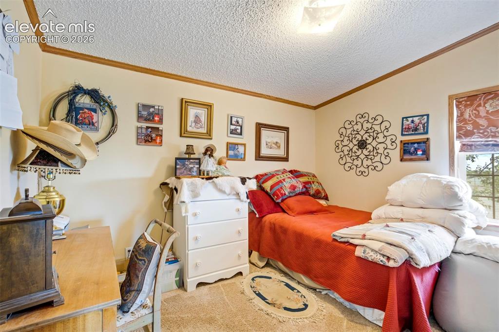 Image 18 of 49: Bedroom