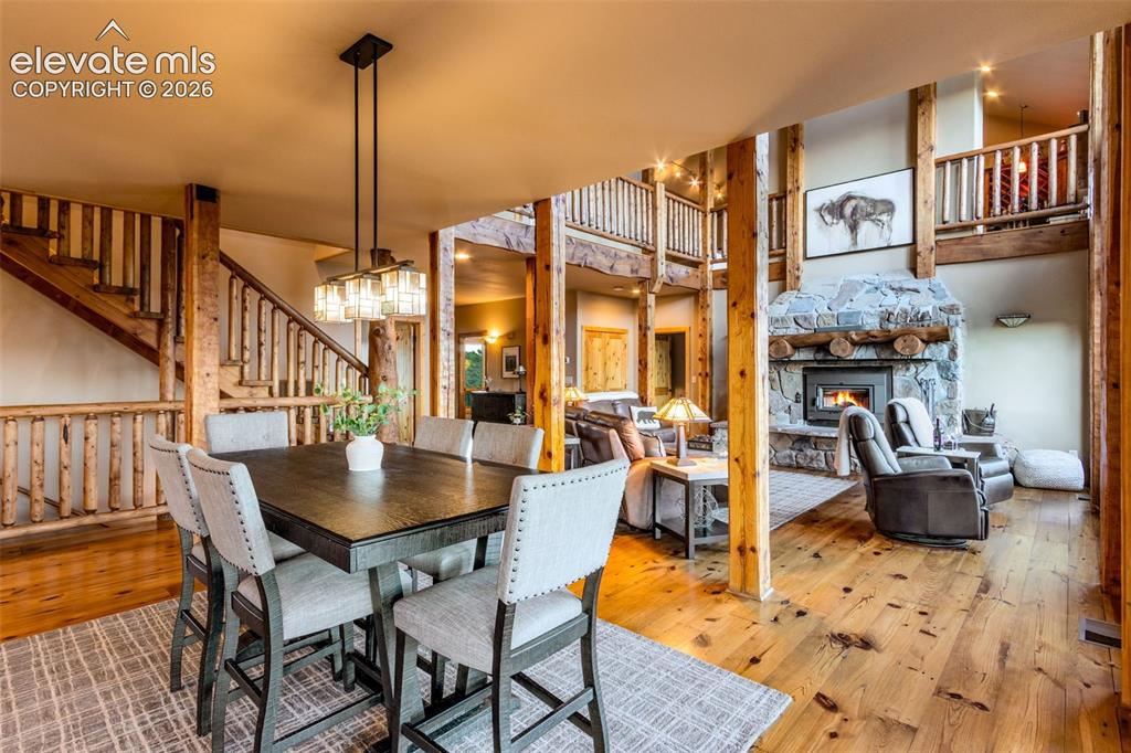 Image 18 of 50: Large formal dining area with new light fixtures throughout and dimmer swit