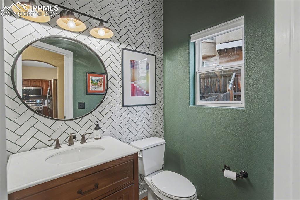 Image 15 of 42: Main level powder room