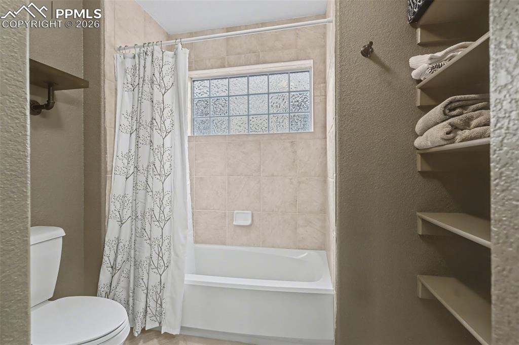 Image 29 of 42: Ensuite bath for bedroom #2 upper level