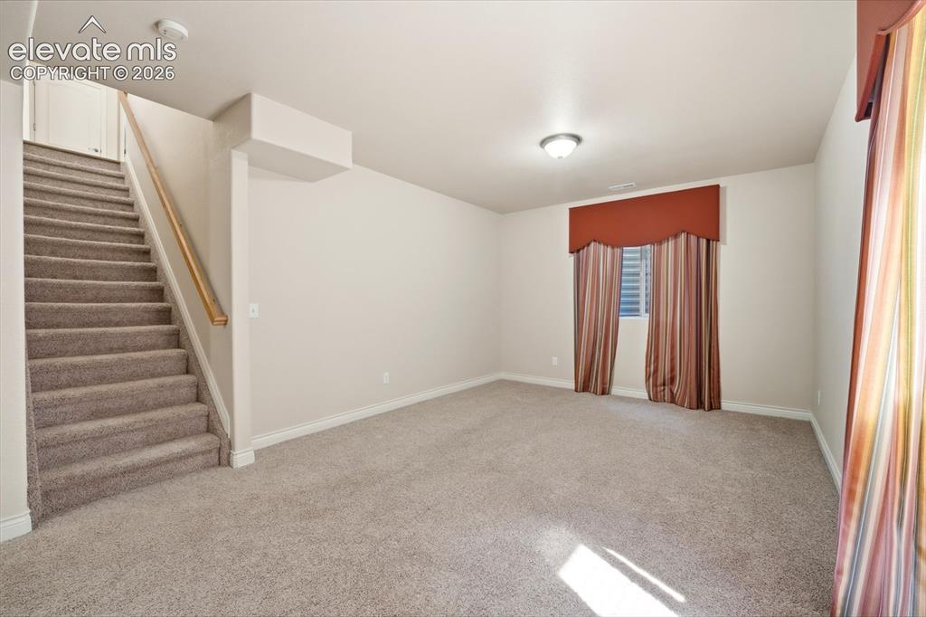 Image 19 of 35: Basement Living Room