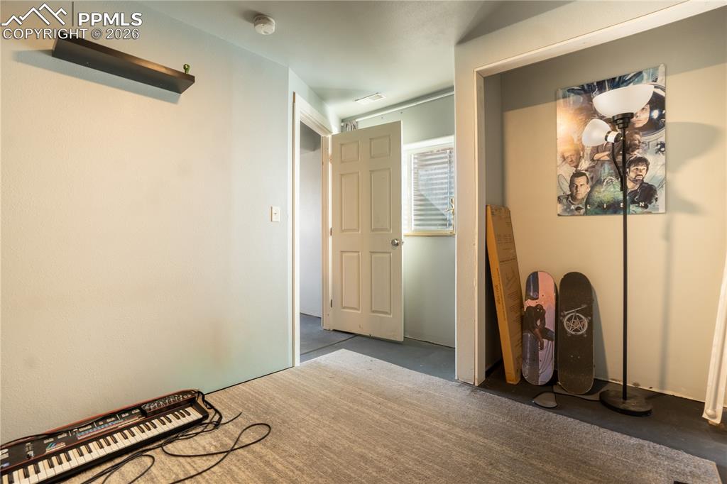 Image 31 of 40: Unfurnished bedroom featuring carpet