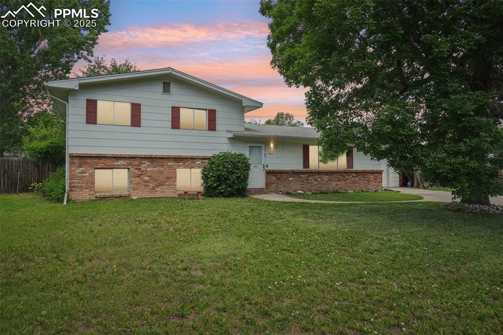 Caption: Twilight picture of the front of the lovely home!