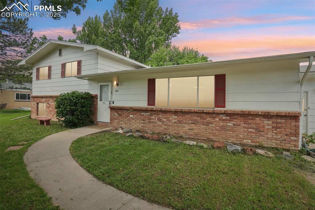 Image 2 of 49: Additional twilight shot of the front of this home