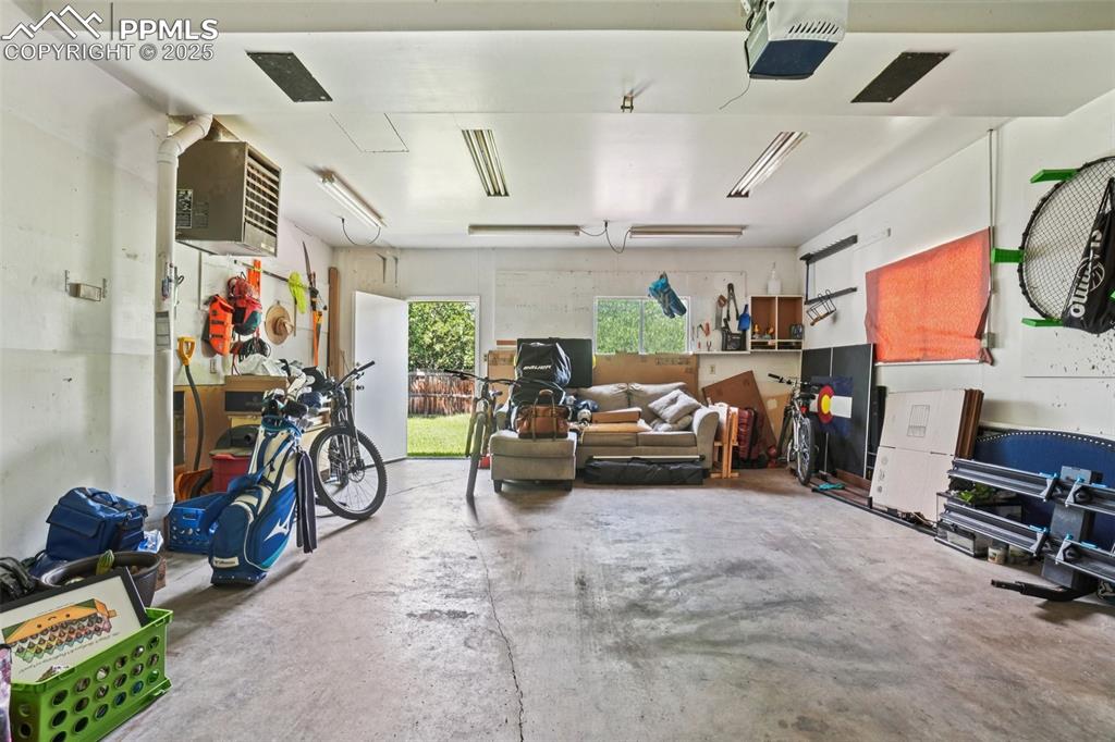 Image 31 of 49: Heated, oversized garage!